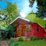 the unusual cottages are set in a lovely garden